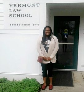 niaome hickman standing in front of vermont law school