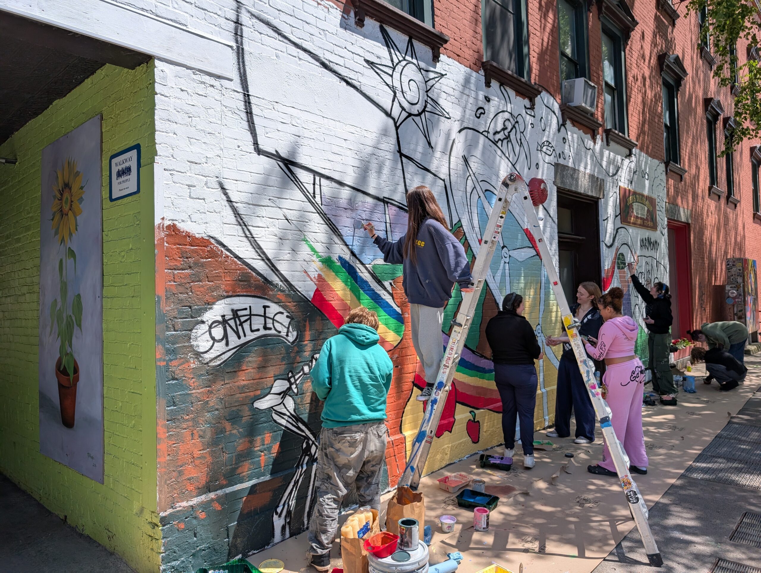 New Roots Students and Staff Paint Public Mural Project